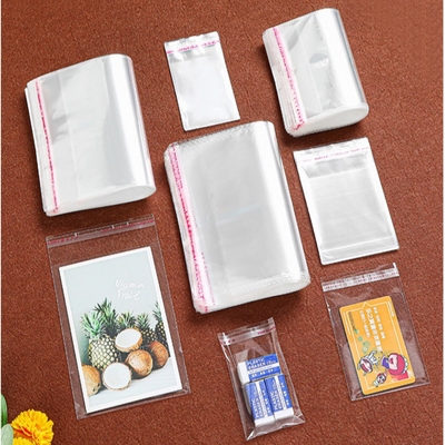 Width 24cm Custom Logo Printing Resealable Apparel Package Self Sealing Bopp Transparent Cello Bag Clear Plastic Cellophane Bags